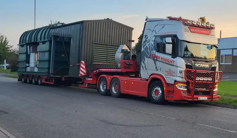 Container being moved