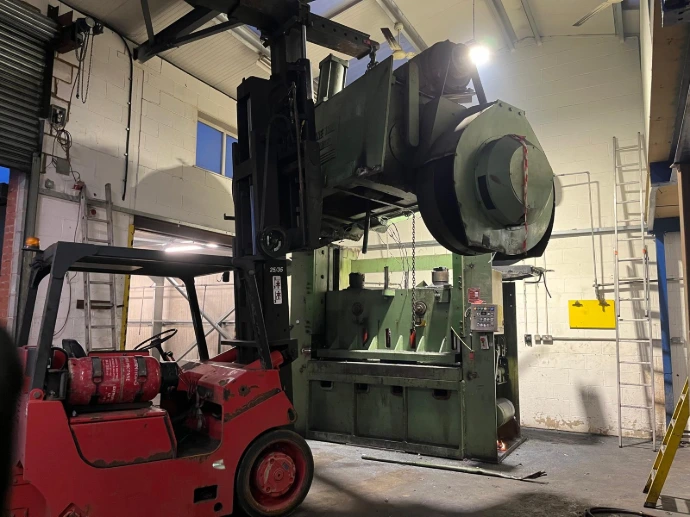 Machine being lifted